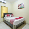 Отель OYO 90907 Handika Jaya Bs, фото 17