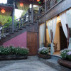 Отель Sweet August Designer Senshi Concept Garden Inn (Lijiang Ancient City Protection House Branch), фото 15