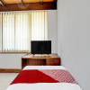 Отель OYO 91846 Ms Rini Homestay Syariah, фото 11