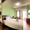 Отель Classic Studio Room Apartment at Oxford Jatinangor, фото 13
