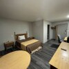Отель Mid Towne Inn and Suites, фото 3