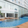 Отель Modern And Compact Studio At Grand Sungkono Lagoon Apartment, фото 11