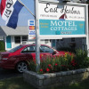 Отель East Harbour Motel and Cottages, фото 1