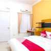 Отель OYO 617 Sukaraja Residence Syariah, фото 5