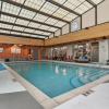 Отель Cozysuites Mill District Pool gym 10, фото 14