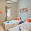 Отель Manggolo Homestay Syariah, фото 25
