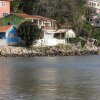 Отель Linda casa 3 quartos 60 m da praia em Florianópolis - ideal para famílias во Флорианополисе