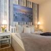 Отель Strandhotel-Heiligenhafen-Wohnung-101-Typ-IV-Wasserblick, фото 5