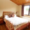 Отель Stunning 4 Bedlog Cabin in Kerrykeel - Sleeps 10, фото 3