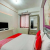 Отель OYO Flagship 90087 Apartment Menara Rungkut 2, фото 5