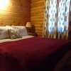 Отель Cajun Cedar Log Cottages, фото 6