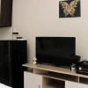 Отель Cozy And Modern Studio Apartment At Springlake Summarecon Bekasi, фото 1