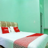 Отель OYO 92950 Orien Guesthouse, фото 4