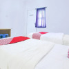 Отель OYO Life 91127 Wisma Sukajadi Syariah, фото 6