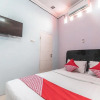 Отель OYO 1319 Puspita Guesthouse, фото 5