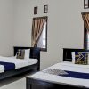 Отель OYO Life 92509 Maulana Guest House Simpur, фото 19