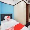Отель OYO 3892 Athaya Guesthouse Syariah, фото 9