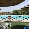 Отель Appartamento Palazzeta Con Piscina 3 Km Dal Mare, фото 23