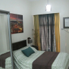 Отель Premium Residence The Currency Ortigas, фото 2