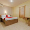 Отель RedDoorz Plus near Pantai Malalayang Manado, фото 17
