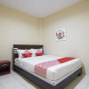 Отель OYO 1075 Rumah Indah Losari Inn, фото 4