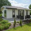 Отель Modern chalet with combi-microwave near Brunssummerheide, фото 2