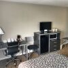 Отель BridgePointe Inn & Suites, фото 4
