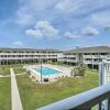 Отель Oak Island Beachfront Condo w/ Community Pool, фото 13