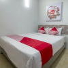 Отель OYO 2187 Hm Guest House, фото 4
