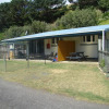 Отель Port Waikato Holiday Park, фото 1