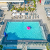 Отель Beachfront Resort Hot Tub Pool- Near Beach, фото 27