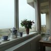 Отель Holiday Apartment With a View of the Dunes, Sea, and Lighthouse, фото 1