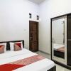 Отель OYO 91243 Bina Syariah Guest House, фото 6