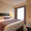 Отель Grand Suites Grand Okanagan by KelownaGo, фото 4