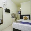 Отель SPOT ON 2219 Madina Residence Syariah, фото 3