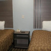 Отель Woodland Inn and Suites, фото 8