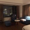Отель Taishan Orange Hotel Wanda Plaza, фото 2