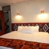 Отель New Day Inn Mapi в Агуас-Кальентесе
