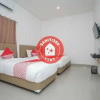 Отель OYO 3872 Wisma Family, фото 11