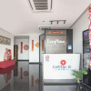 Отель Capital O 90447 Hotel Ezzyhome Kebun Teh, фото 11