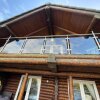 Отель Woodpecker Log Cabin with hot tub, pizza oven bbq entertainment area, lakeside with private fishing , фото 1