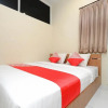 Отель OYO 1250 Unta Residence, фото 5