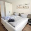 Отель Grosse-Ferienwohnung-3-mit-Meerblick-und-Strandkorb-im-Haus-Seeluft-Duhnen, фото 7