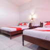 Отель OYO 2411 Taman Mekar Beach Inn 2, фото 4