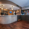 Отель Guest Inn & Suites - Midtown Medical Center, фото 1