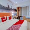 Отель OYO 3905 Graha 100 Guest House Syariah, фото 16