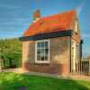 Отель Spacious Farmhouse in IJzendijke with Garden, фото 8