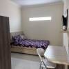 Отель OYO 91332 City-m Urban Homestay Syariah, фото 8