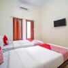 Отель OYO 90869 Happy Homestay Syariah, фото 5