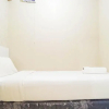 Отель Homey And Cozy Living 2Br At Bassura City Apartment, фото 7